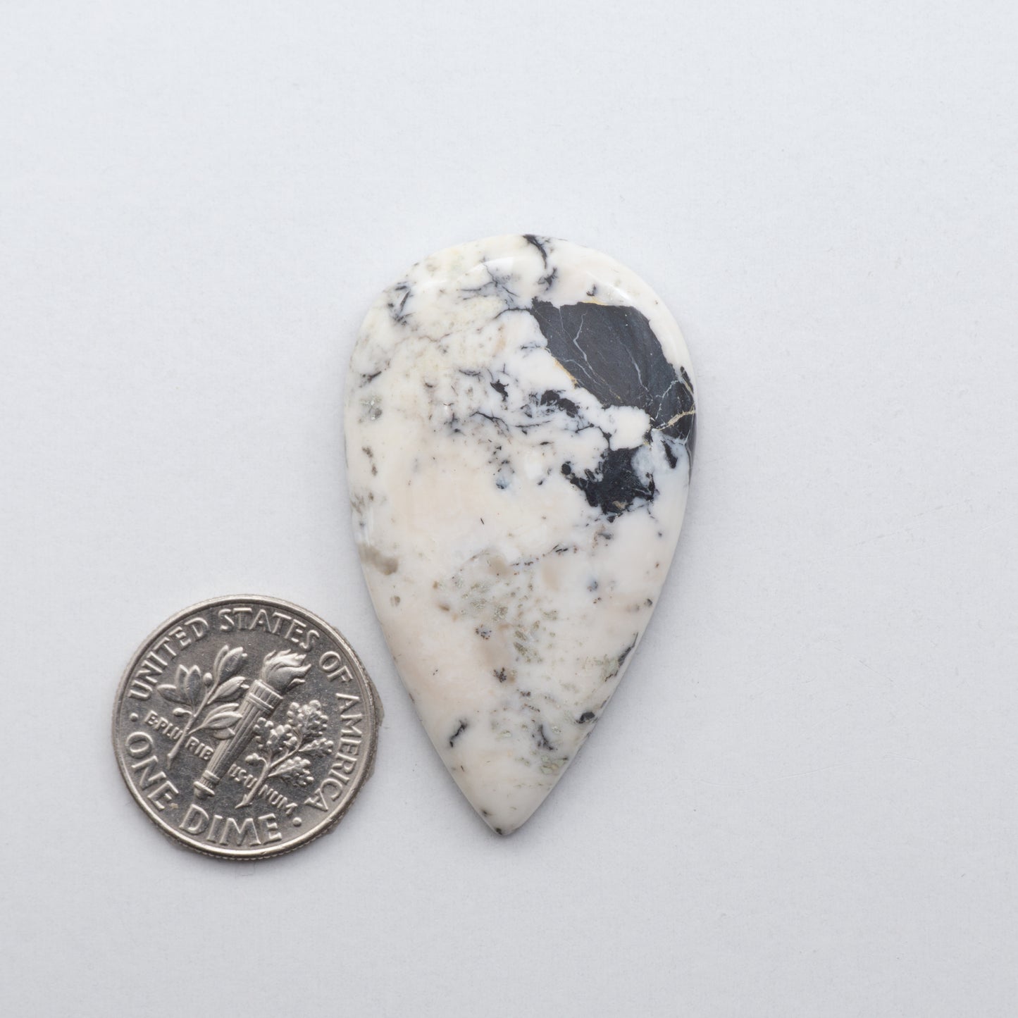 These Natural White Buffalo Stone Cabochons are semi-precious gemstones cut into shapes ideal for jewelry-making