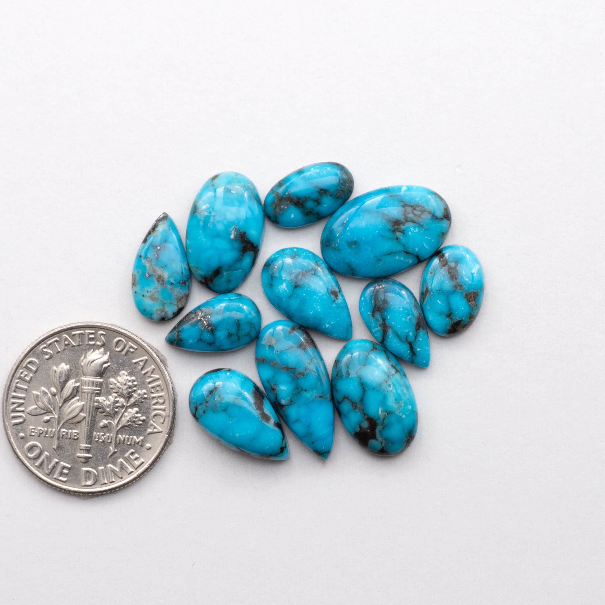 Experience the beauty of the Turquoise Mountain with our stunning&nbsp; Turquoise Mountain cabochons. With their distinctive blue color and unique matrix patterns, these cabochons are perfect for adding a touch of natural elegance to any jewelry piece