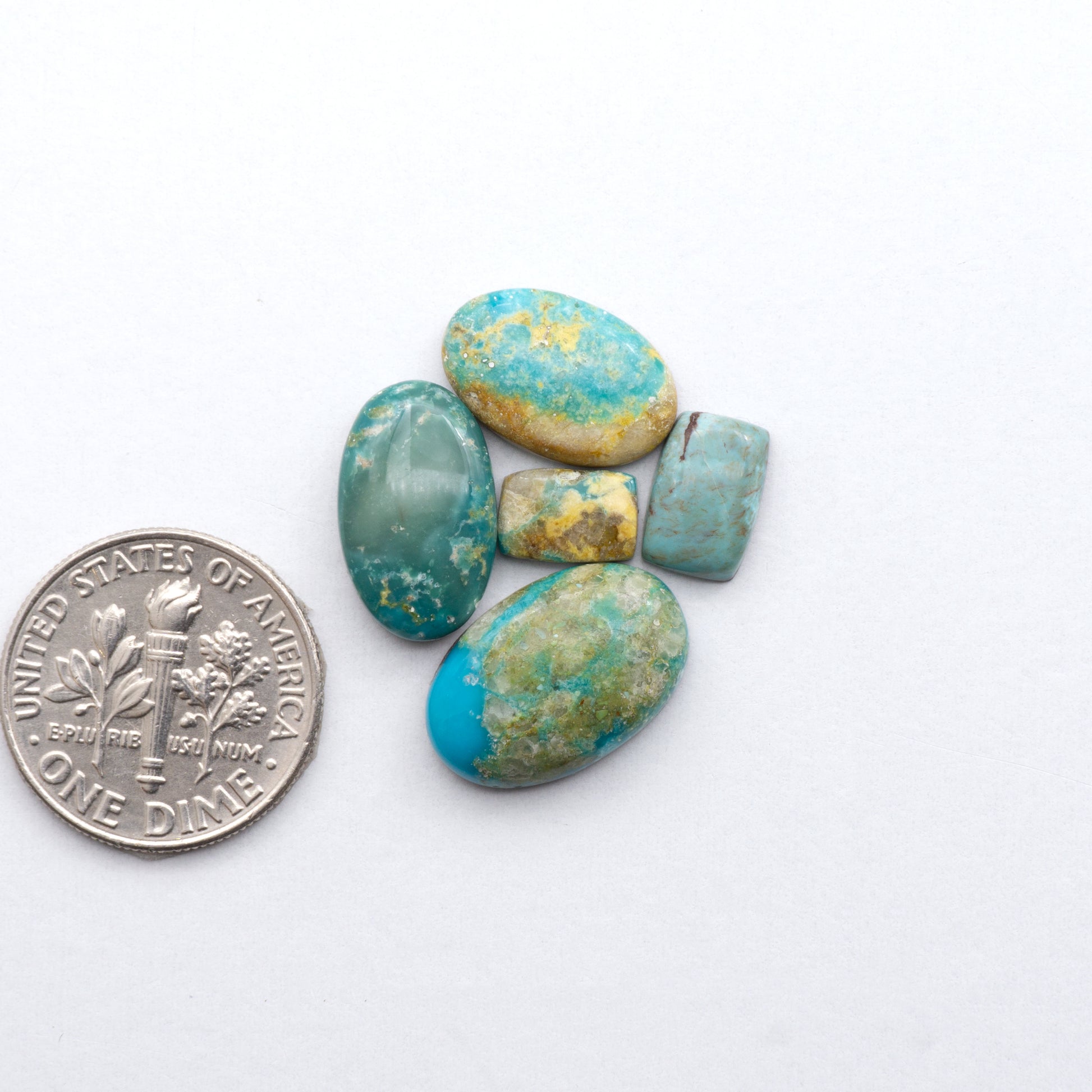 Gorgeous Sonoran South Hill Turquoise cabochons perfect for jewelry making or collecting. Known for its stunning blue-green color and rarity, this gem will add a touch of elegance to any piece.