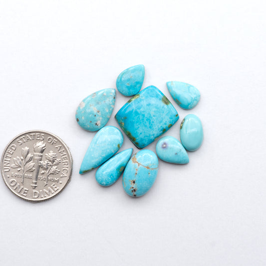 Gorgeous Sonoran South Hill Turquoise cabochons perfect for jewelry making or collecting. Known for its stunning blue-green color and rarity, this gem will add a touch of elegance to any piece.