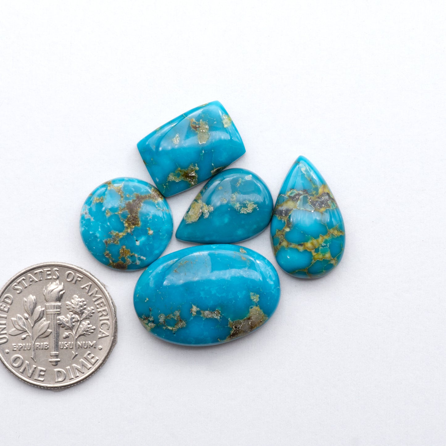 Gorgeous Sonoran South Hill Turquoise cabochons perfect for jewelry making or collecting. Known for its stunning blue-green color and rarity, this gem will add a touch of elegance to any piece.