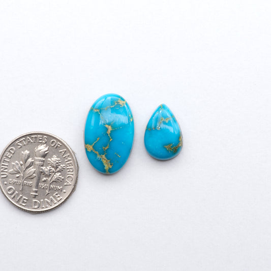 Gorgeous Sonoran South Hill Turquoise cabochons perfect for jewelry making or collecting. Known for its stunning blue-green color and rarity, this gem will add a touch of elegance to any piece.