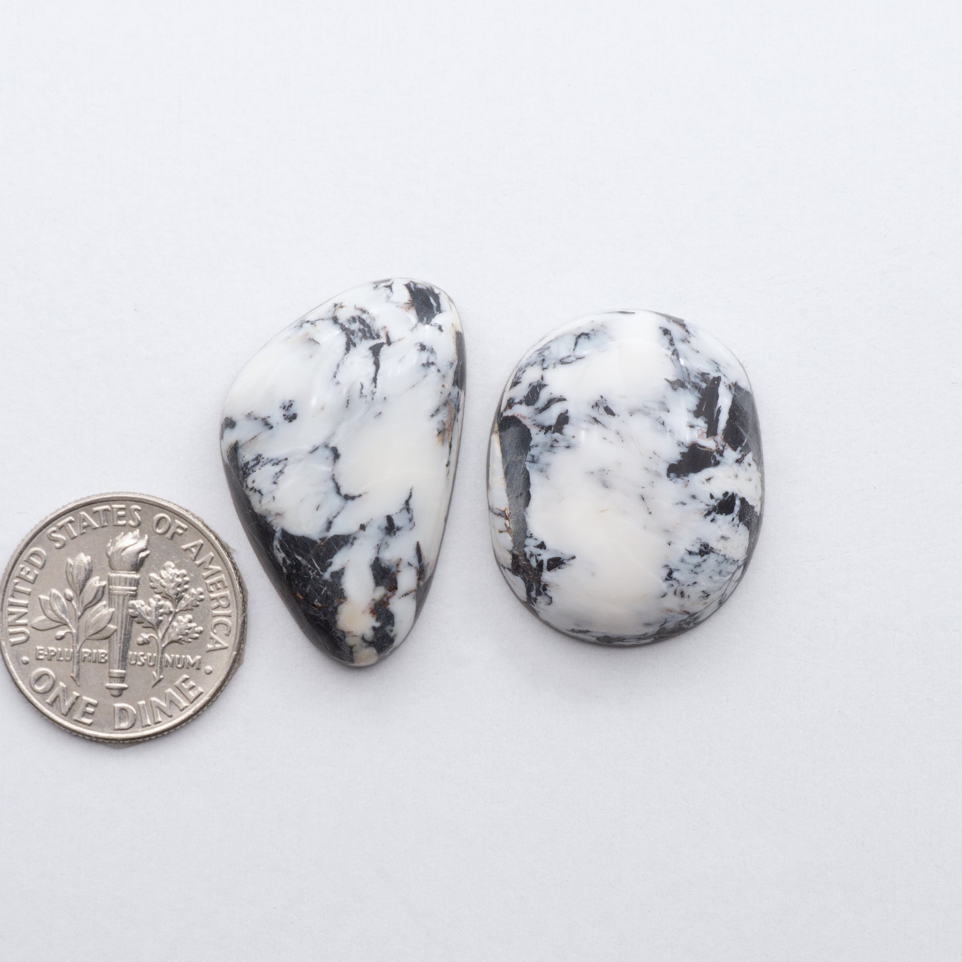 These Natural White Buffalo Stone Cabochons are semi-precious gemstones cut into shapes ideal for jewelry-making and crafting and are backed for added strength. 