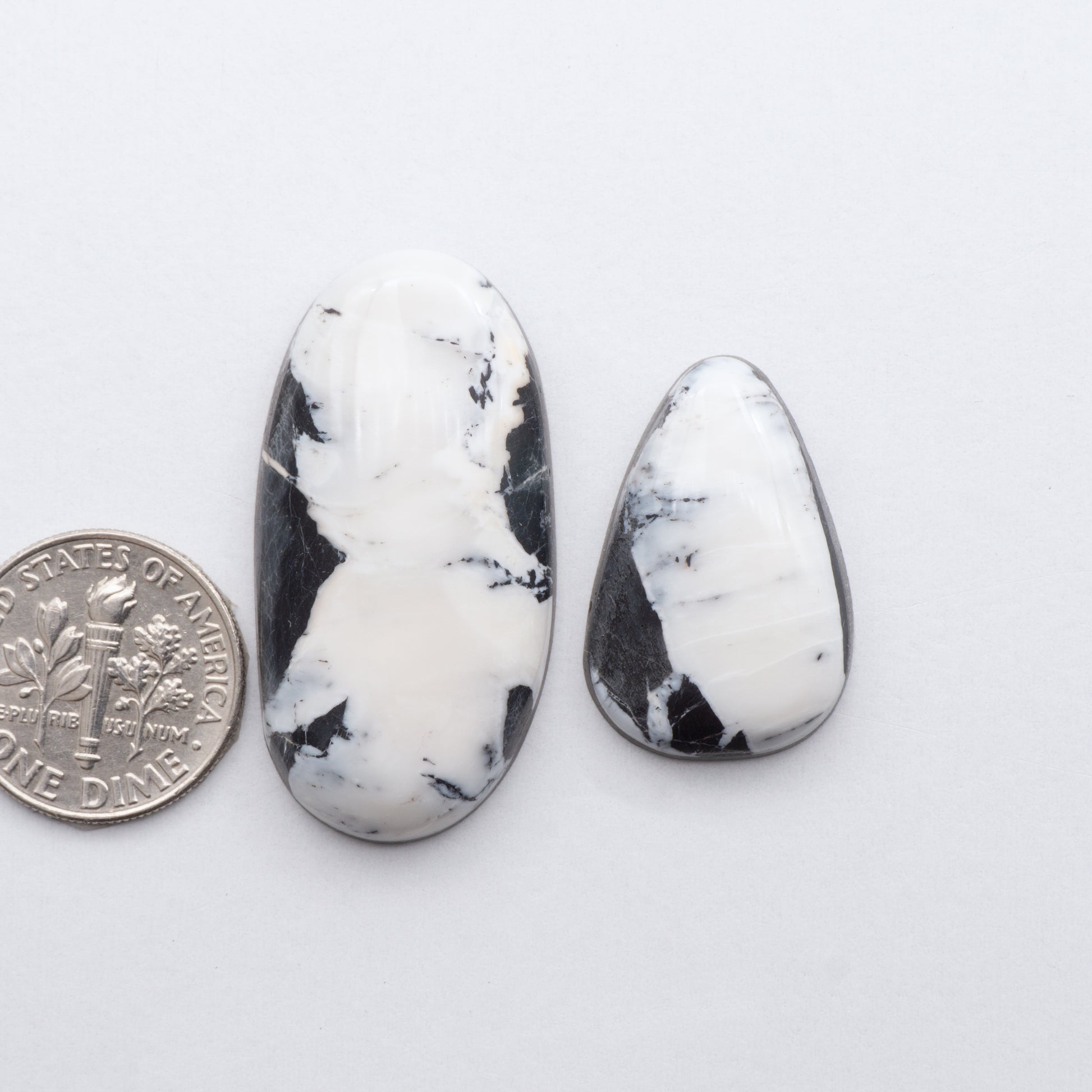 These Natural White Buffalo Stone Cabochons are semi-precious gemstones cut into shapes ideal for jewelry-making and crafting and are backed for added strength. 