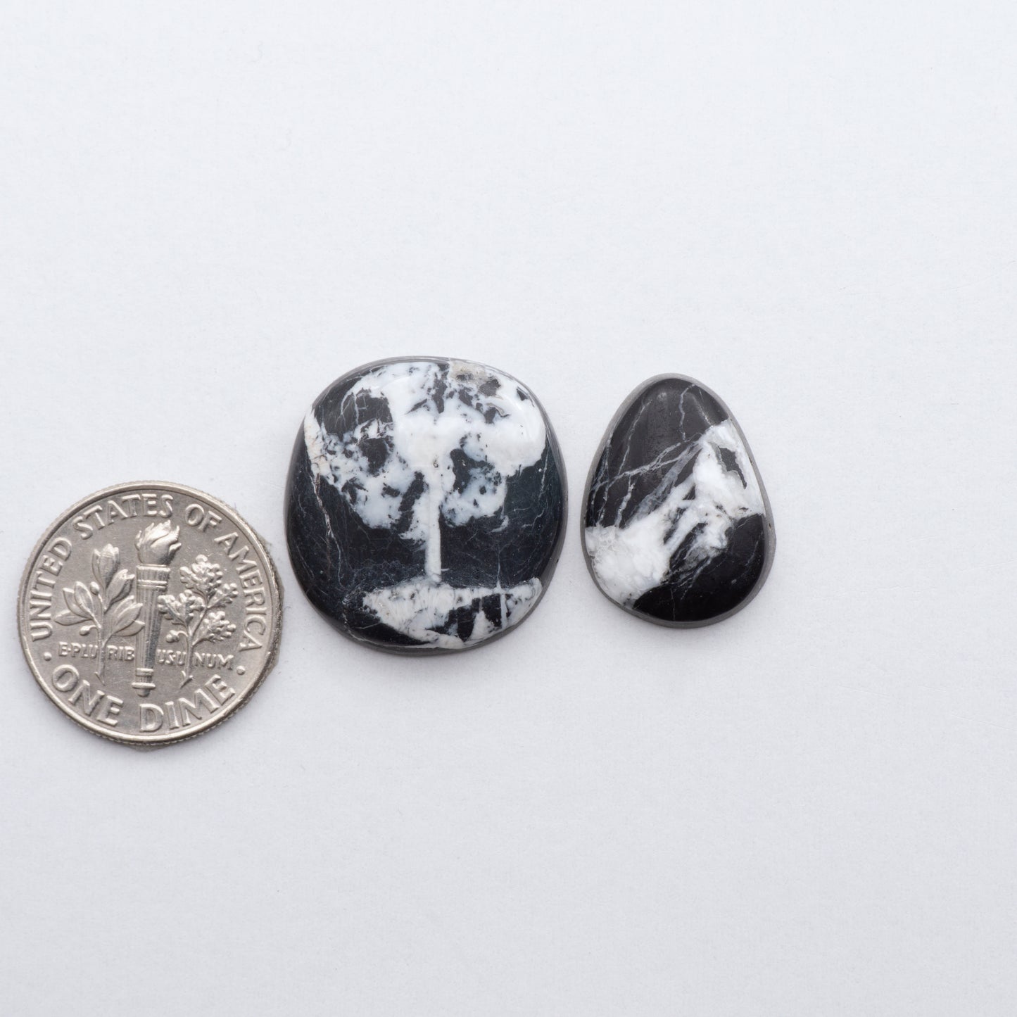 These Natural White Buffalo Stone Cabochons are semi-precious gemstones cut into shapes ideal for jewelry-making and crafting and are backed for added strength. 