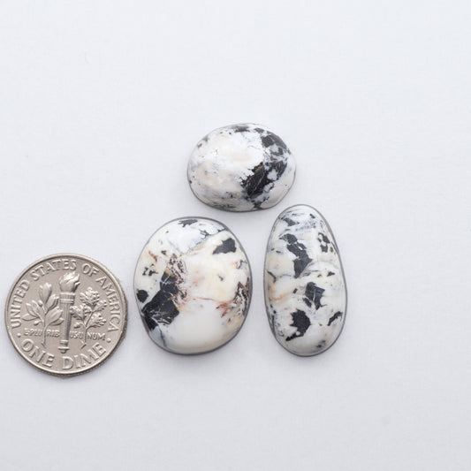 These Natural White Buffalo Stone Cabochons are semi-precious gemstones cut into shapes ideal for jewelry-making and crafting and are backed for added strength. 