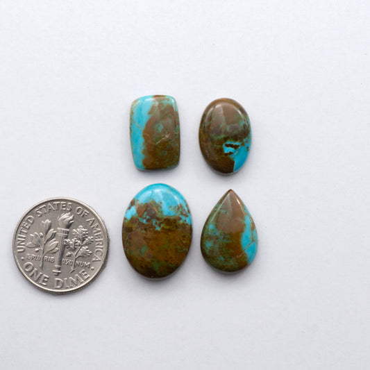 Add a touch of unique beauty to your collection with our stunning Pilot Mountain Turquoise cabochons. 