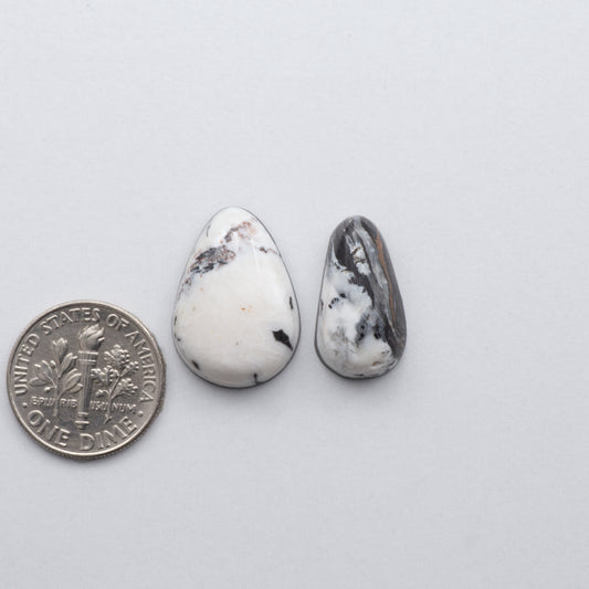 White Buffalo Cabochons are expertly cut and polished from composite material to create a stunning and durable gemstone.