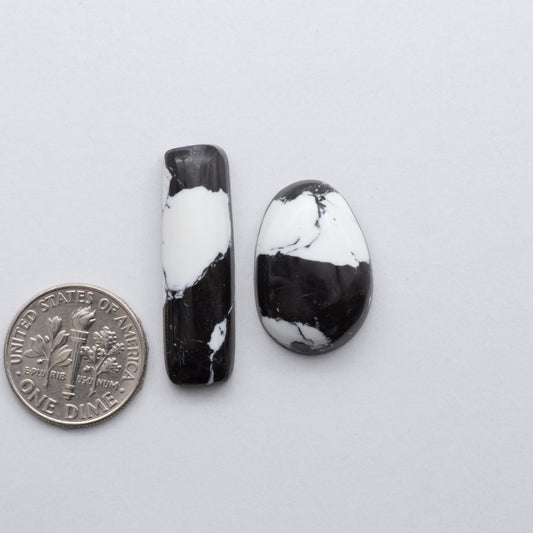 White Buffalo Cabochons are expertly cut and polished from composite material to create a stunning and durable gemstone.