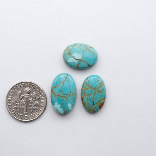 Add a touch of unique beauty to your collection with our stunning Pilot Mountain Turquoise cabochons. Mined in Nevada, USA, these cabochons are satbilized and backed afor added strength.