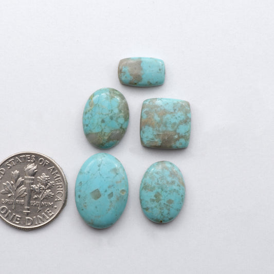 Add a touch of unique beauty to your collection with our stunning Pilot Mountain Turquoise cabochons. Mined in Nevada, USA, these cabochons are satbilized and backed afor added strength.