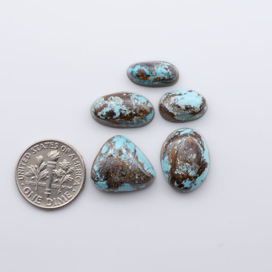 Natural Royston Turquoise is renowned for its unique shades of green and blue, making these cabochons a popular choice for jewelry makers.