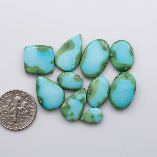 Discover the unique beauty of Sonoran Mountain Turquoise. This rare gemstone showcases a stunning blend of blue and green hues.