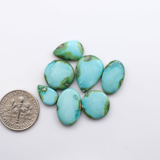 Discover the unique beauty of Sonoran Mountain Turquoise. This rare gemstone showcases a stunning blend of blue and green hues.