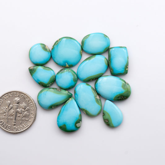 Discover the unique beauty of Sonoran Mountain Turquoise. This rare gemstone showcases a stunning blend of blue and green hues.