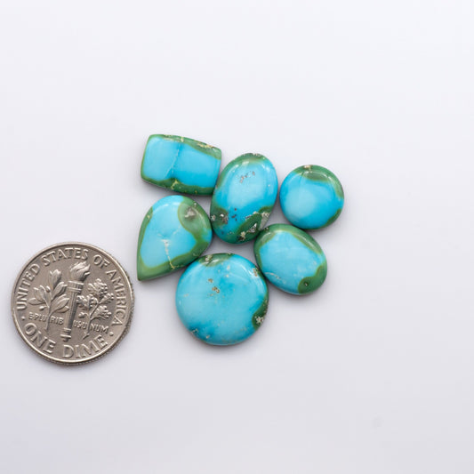 Discover the unique beauty of Sonoran Mountain Turquoise. This rare gemstone showcases a stunning blend of blue and green hues.