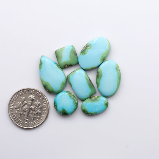 Discover the unique beauty of Sonoran Mountain Turquoise. This rare gemstone showcases a stunning blend of blue and green hues.