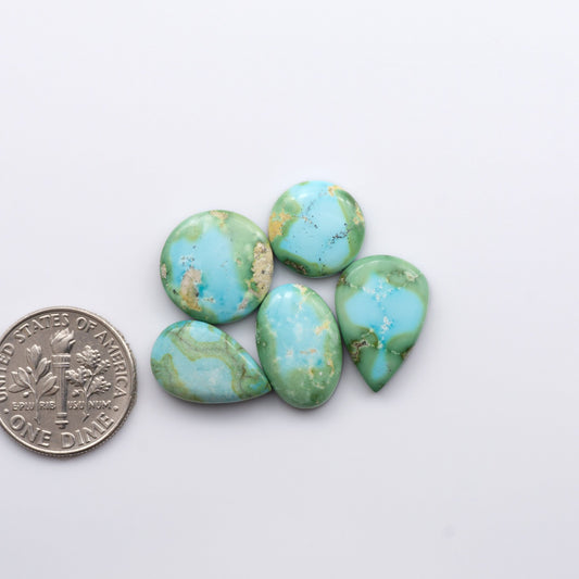 Discover the unique beauty of Sonoran Mountain Turquoise. This rare gemstone showcases a stunning blend of blue and green hues.