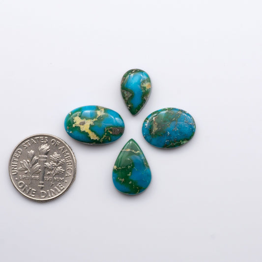 Discover the unique beauty of Sonoran Mountain Turquoise. This rare gemstone showcases a stunning blend of blue and green hues.