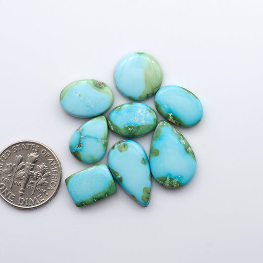 Gorgeous Sonoran South Hill Turquoise cabochons are perfect for jewelry making or collecting. Known for its stunning blue-green color and rarity, this gem will add a touch of elegance to any piece.