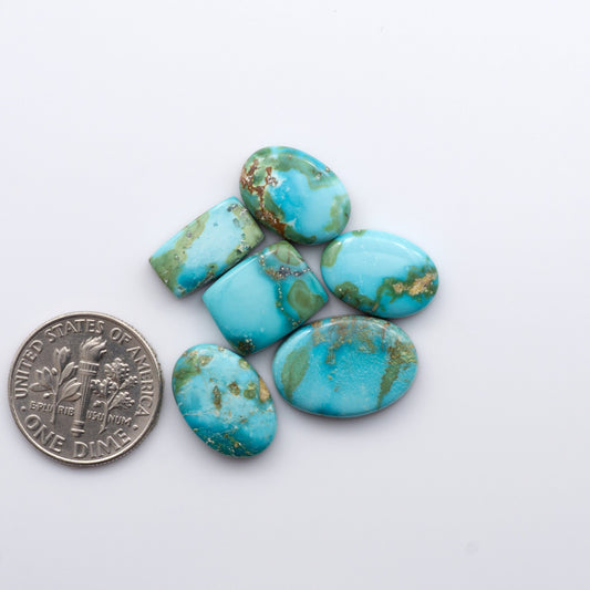 Gorgeous Sonoran South Hill Turquoise cabochons are perfect for jewelry making or collecting. Known for its stunning blue-green color and rarity, this gem will add a touch of elegance to any piece.