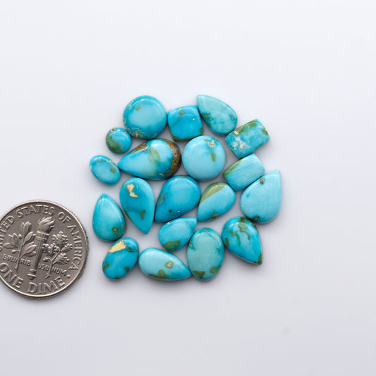 Gorgeous Sonoran South Hill Turquoise cabochons are perfect for jewelry making or collecting. Known for its stunning blue-green color and rarity, this gem will add a touch of elegance to any piece.