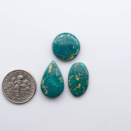 Gorgeous Sonoran South Hill Turquoise cabochons are perfect for jewelry making or collecting. Known for its stunning blue-green color and rarity, this gem will add a touch of elegance to any piece.