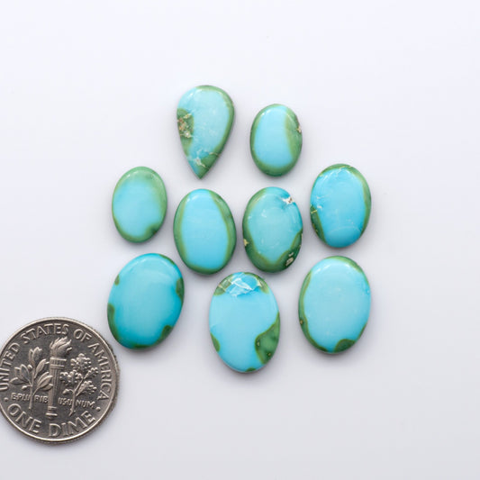 Discover the unique beauty of Sonoran Mountain Turquoise. This rare gemstone showcases a stunning blend of blue and green hues.