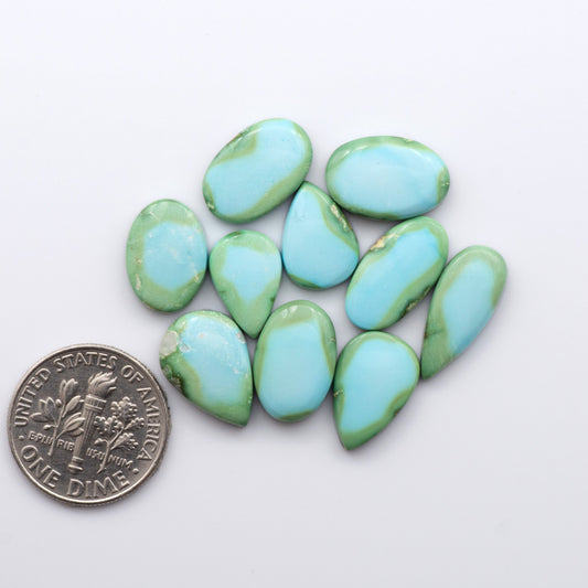 Discover the unique beauty of Sonoran Mountain Turquoise. This rare gemstone showcases a stunning blend of blue and green hues.