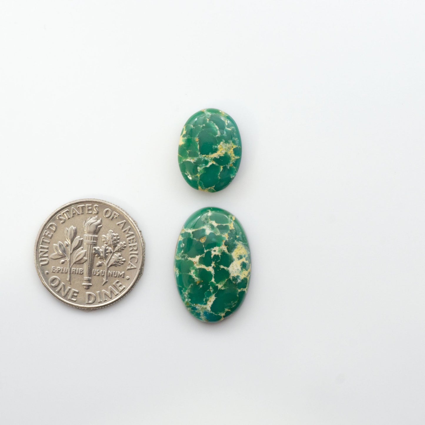 Gorgeous Sonoran South Hill Turquoise cabochons are perfect for jewelry making or collecting. Known for its stunning blue-green color and rarity, this gem will add a touch of elegance to any piece.