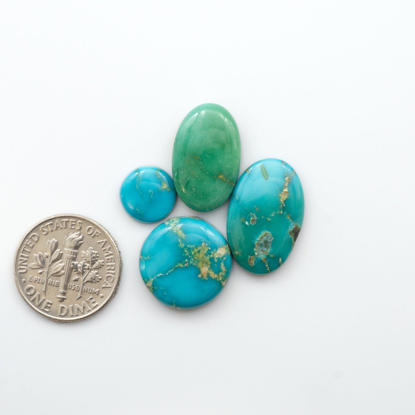 Gorgeous Sonoran South Hill Turquoise cabochons are perfect for jewelry making or collecting. Known for its stunning blue-green color and rarity, this gem will add a touch of elegance to any piece.