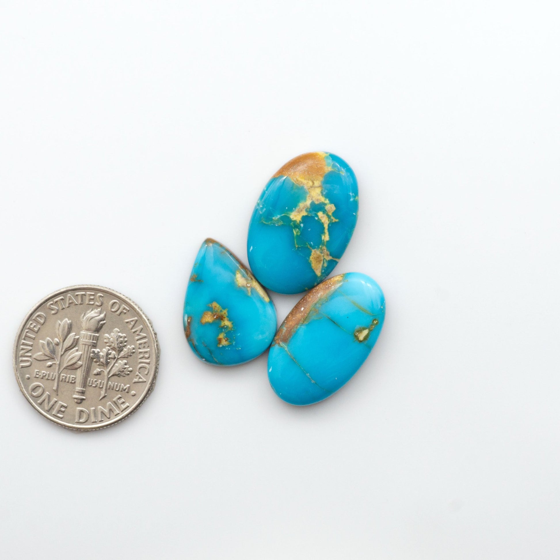 Gorgeous Sonoran South Hill Turquoise cabochons are perfect for jewelry making or collecting. Known for its stunning blue-green color and rarity, this gem will add a touch of elegance to any piece.