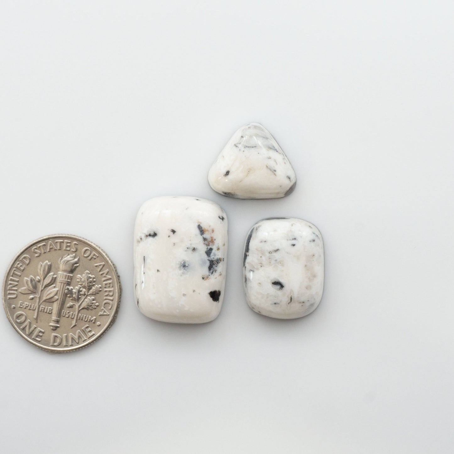 Our Natural White Buffalo Stone Cabochons are semi-precious gemstones cut into shapes ideal for jewelry-making, crafting and are backed for added strength. 