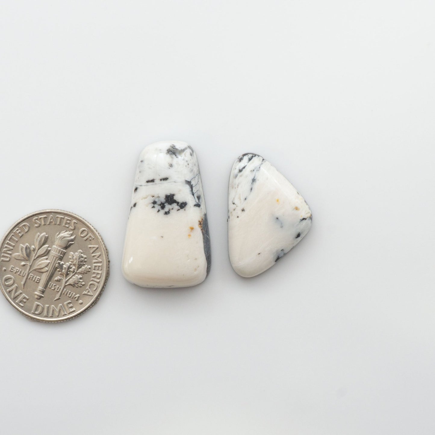 Our Natural White Buffalo Stone Cabochons are semi-precious gemstones cut into shapes ideal for jewelry-making, crafting and are backed for added strength. 