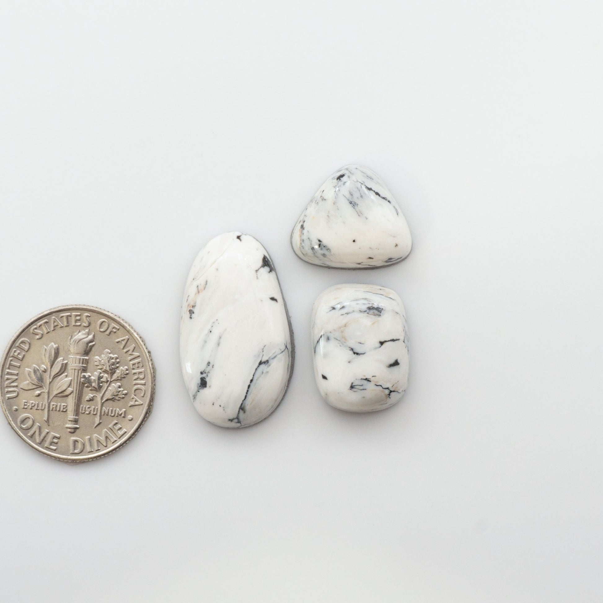 Our Natural White Buffalo Stone Cabochons are semi-precious gemstones cut into shapes ideal for jewelry-making, crafting and are backed for added strength. 