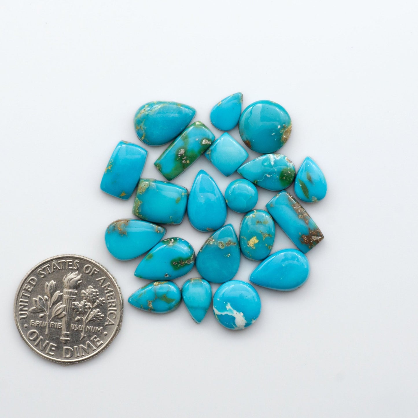 Gorgeous Sonoran South Hill Turquoise cabochons are perfect for jewelry making or collecting. Known for its stunning blue-green color and rarity, this gem will add a touch of elegance to any piece.