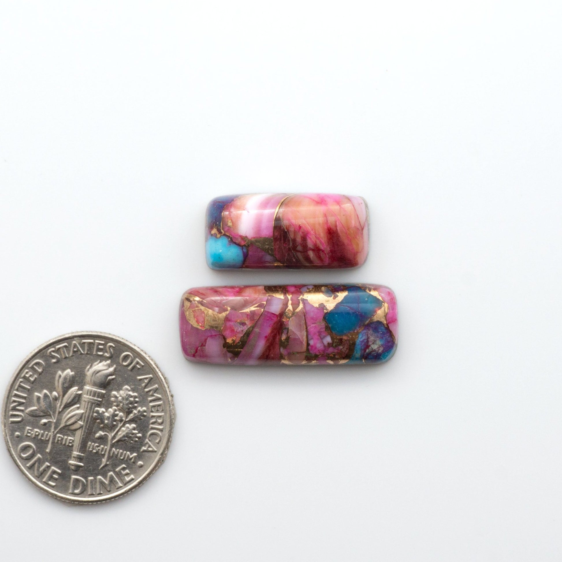 These Spiny Kingman Cabochons are perfect for any jewelry making project. With their unique and intricate patterns, they add a touch of elegance and sophistication to any design. 