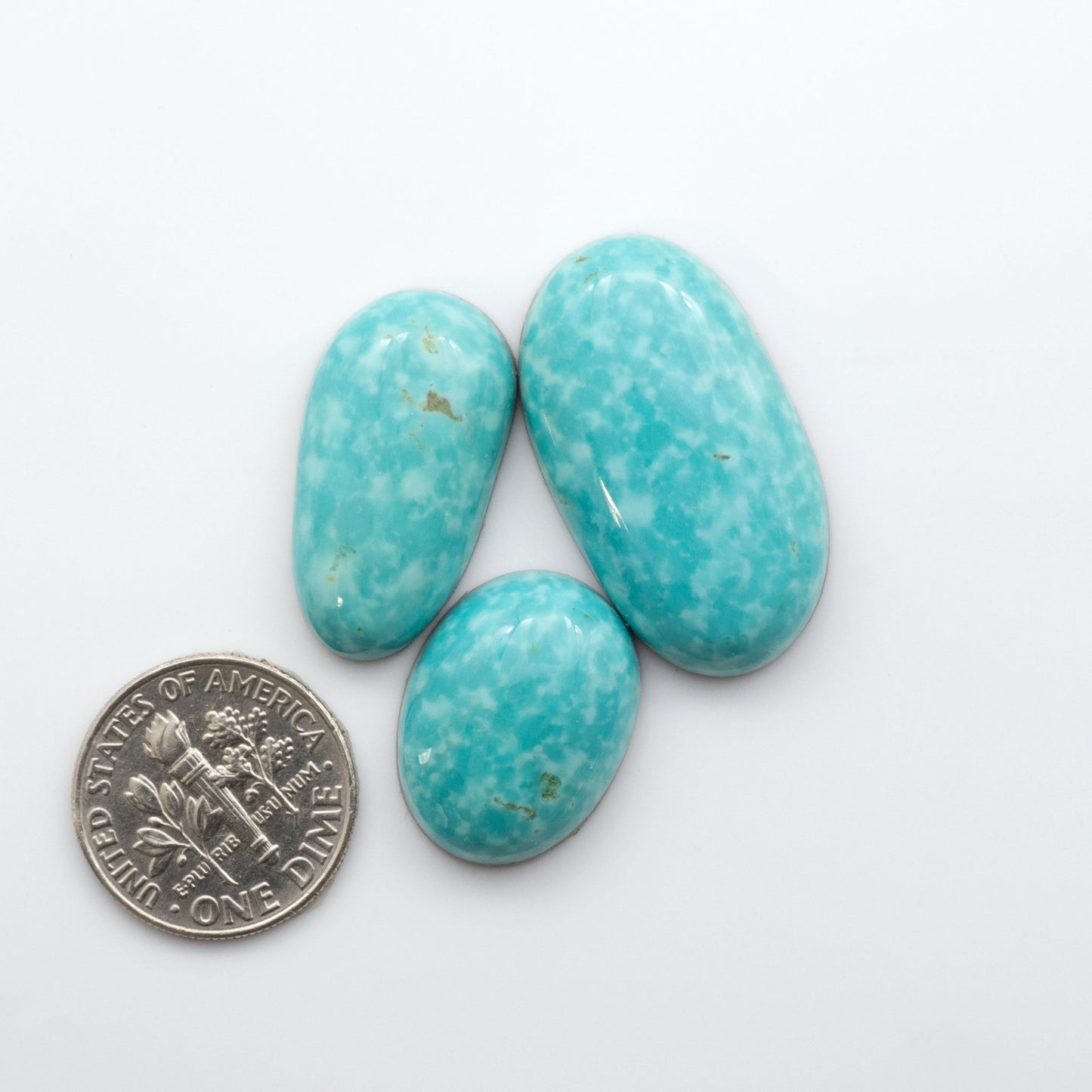 Experience the beauty of our stunning Turquoise Mountain Cabochons. With their distinctive blue and green color, these cabochons are perfect for adding a touch of natural elegance to any jewelry piece.&nbsp;