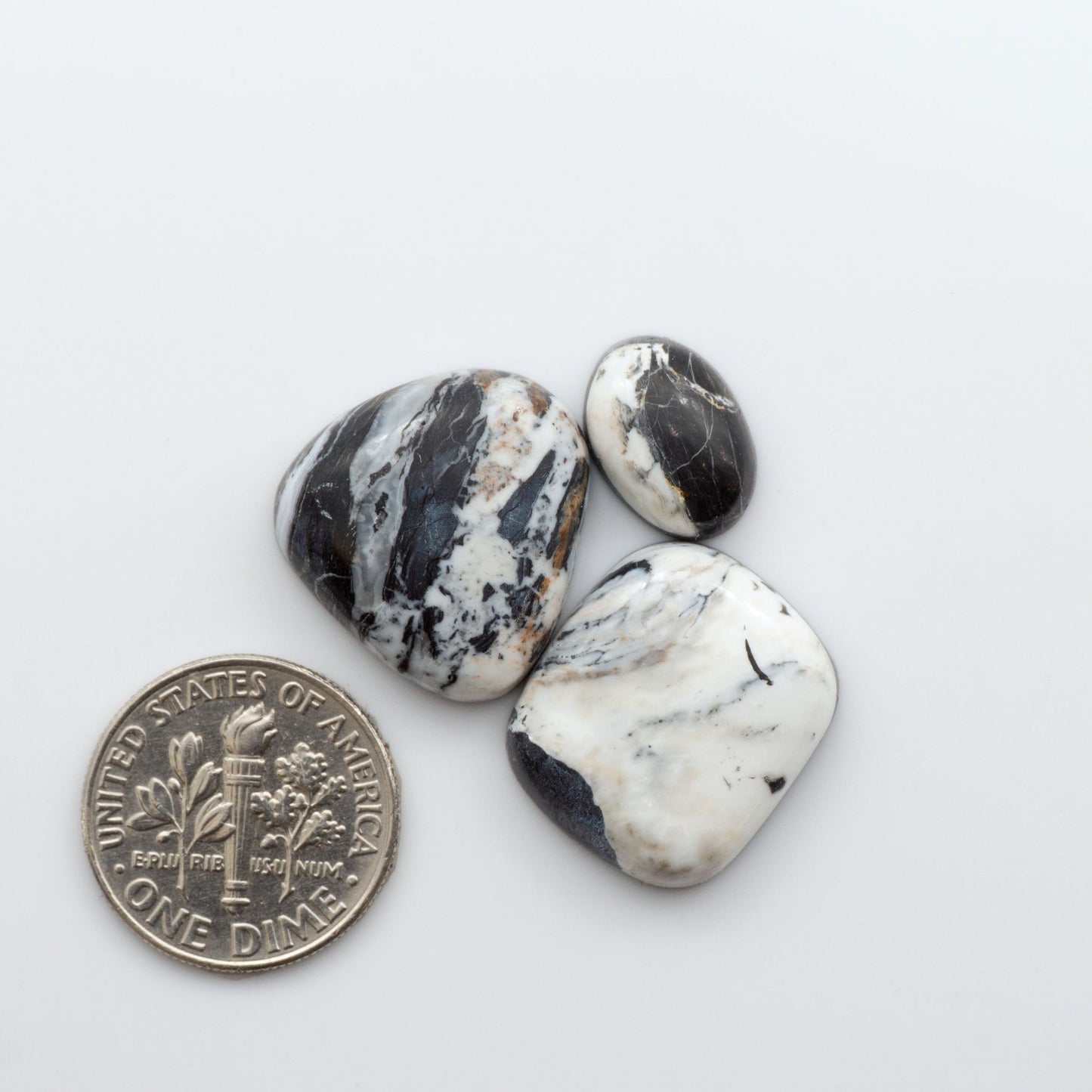 Our Natural White Buffalo Stone Cabochons are semi-precious gemstones cut into shapes ideal for jewelry-making