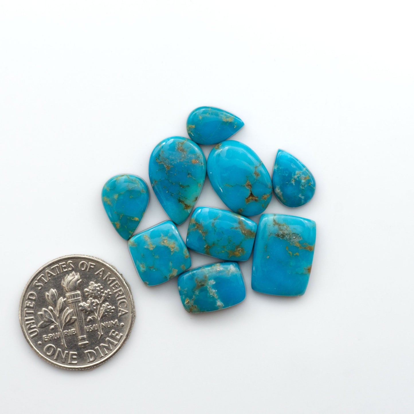 Discover the stunning beauty of Bandits Mine Turquoise, mined in the Sonoran desert. This unique gemstone offers natural variations in color and matrix, making each piece truly unique. 