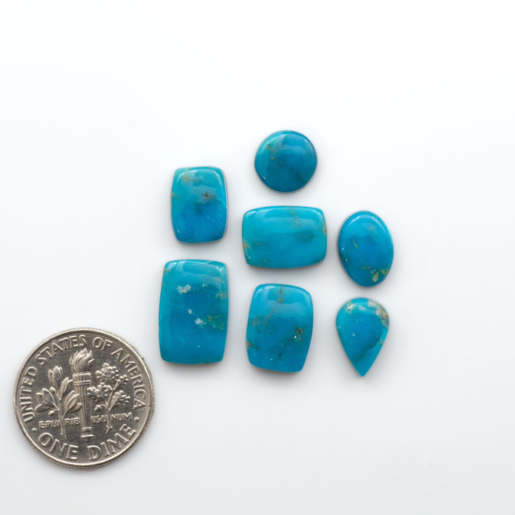 Discover the stunning beauty of Bandits Mine Turquoise, mined in the Sonoran desert. This unique gemstone offers natural variations in color and matrix, making each piece truly unique. 