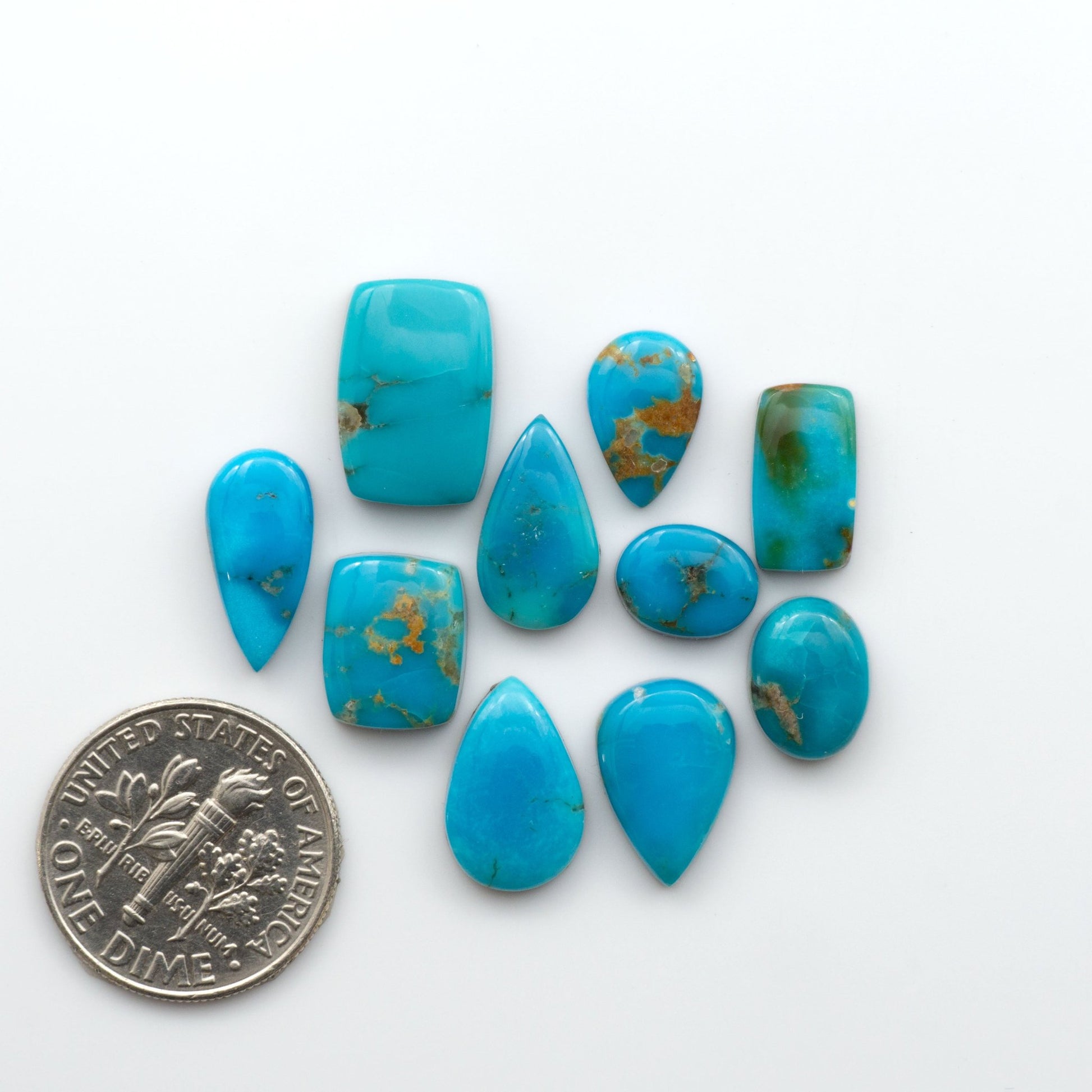 Discover the stunning beauty of Bandits Mine Turquoise, mined in the Sonoran desert. This unique gemstone offers natural variations in color and matrix, making each piece truly unique. 