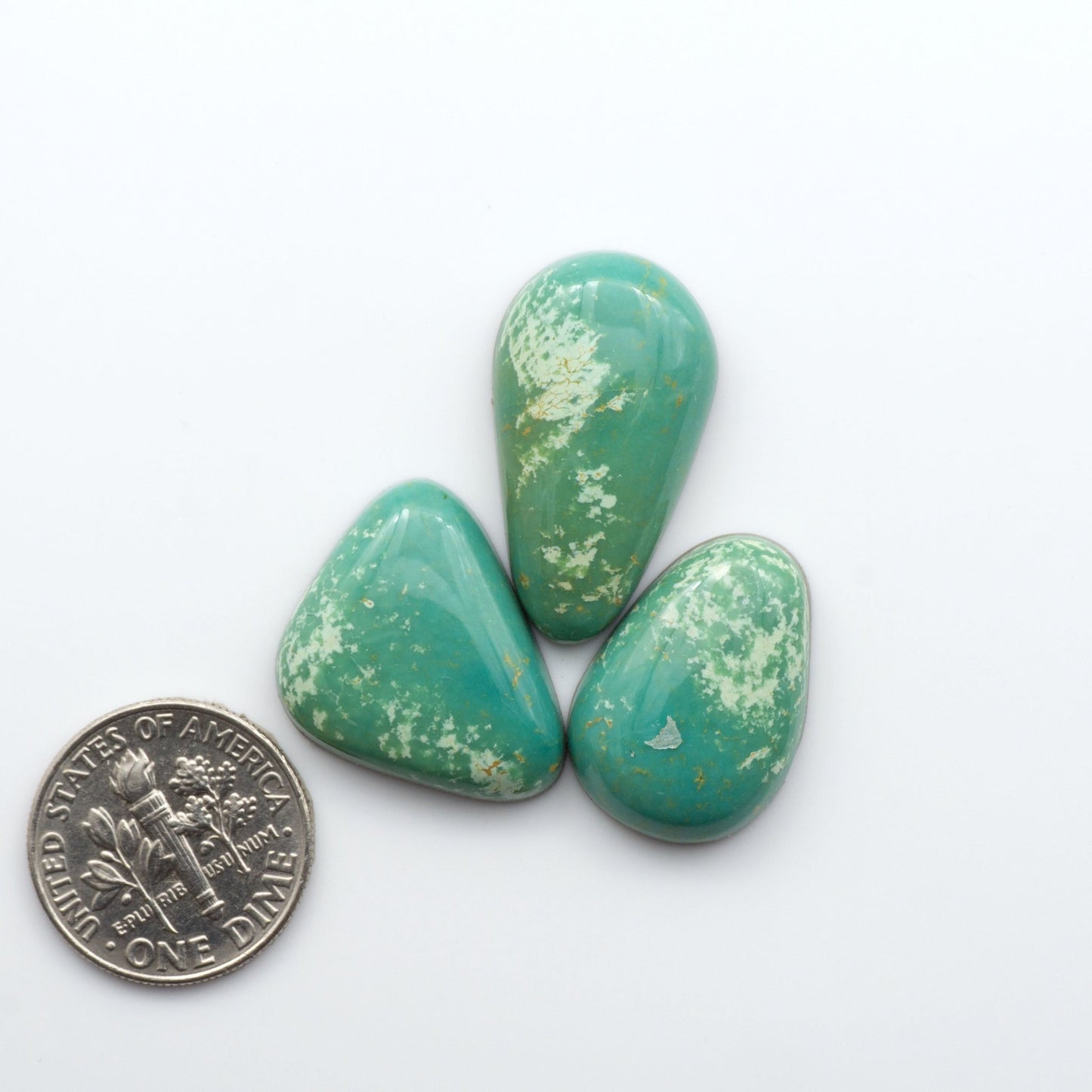 Experience the beauty of our stunning Turquoise Mountain Cabochons. With their distinctive blue and green color, these cabochons are perfect for adding a touch of natural elegance to any jewelry piece.