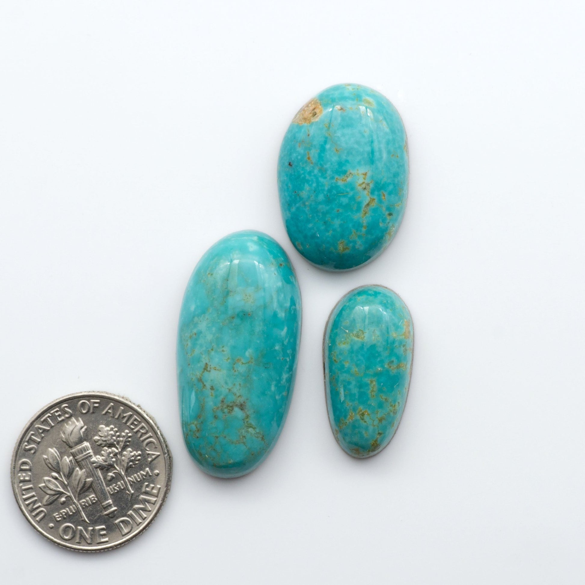 Experience the beauty of our stunning Turquoise Mountain Cabochons. With their distinctive blue and green color, these cabochons are perfect for adding a touch of natural elegance to any jewelry piece.