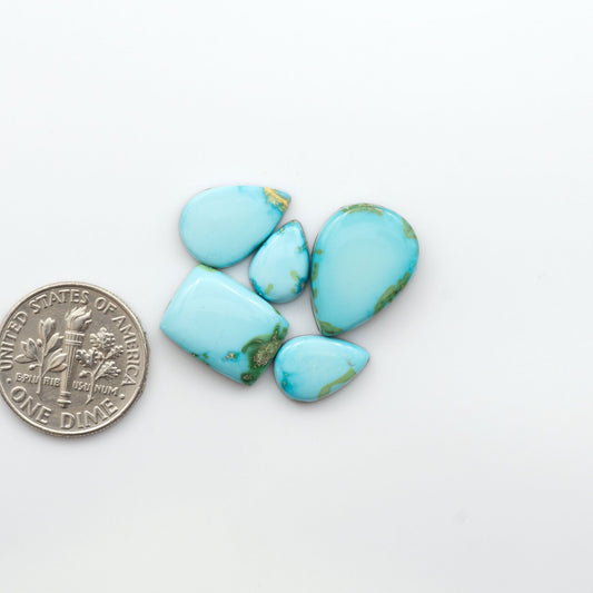 Gorgeous Sonoran South Hill Turquoise cabochons are perfect for jewelry making or collecting. Known for its stunning blue-green color and rarity, this gem will add a touch of elegance to any piece. 