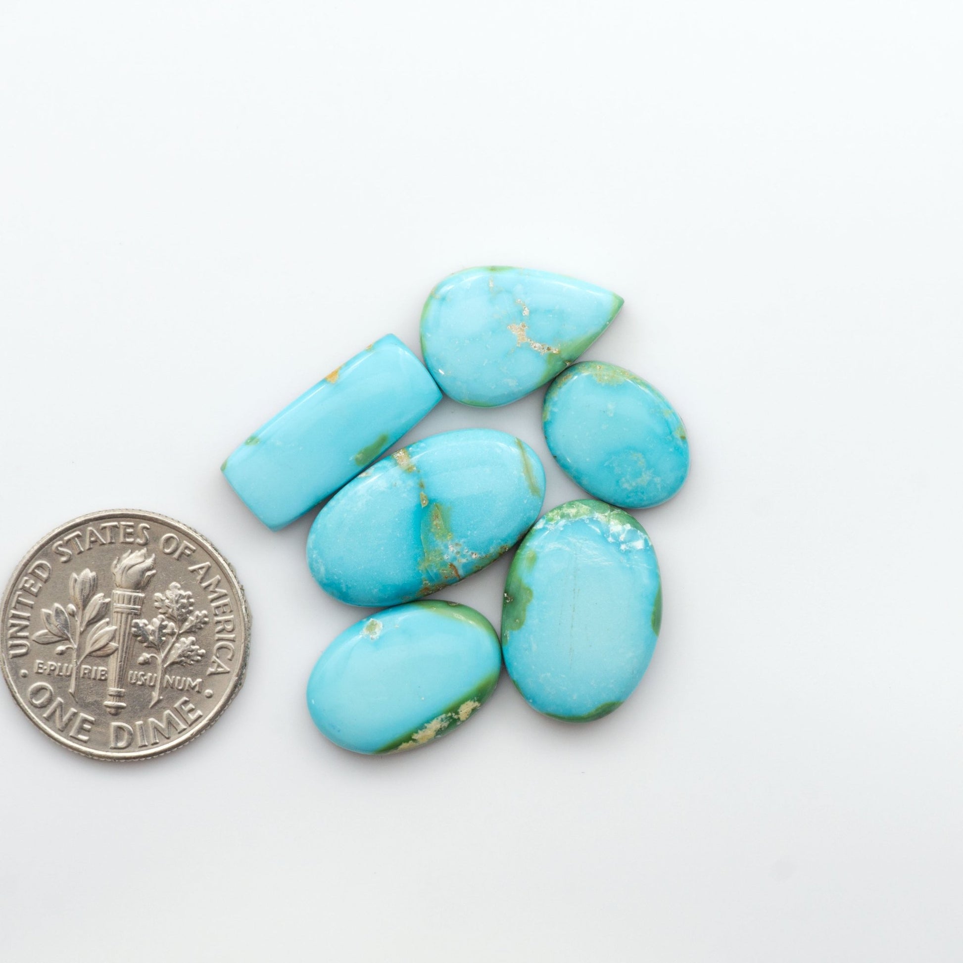 Gorgeous Sonoran South Hill Turquoise cabochons are perfect for jewelry making or collecting. Known for its stunning blue-green color and rarity, this gem will add a touch of elegance to any piece. 