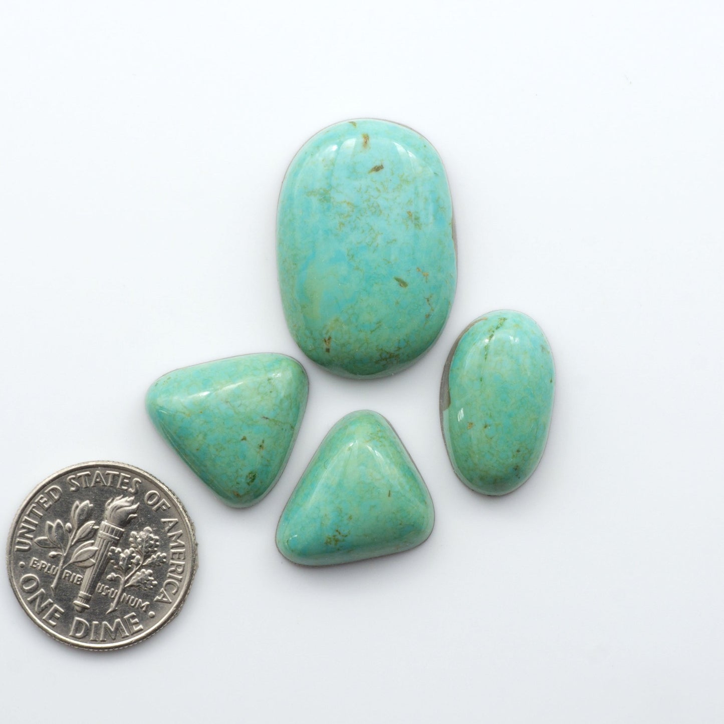 Experience the beauty of our stunning Turquoise Mountain Cabochons. With their distinctive blue and green color, these cabochons are perfect for adding a touch of natural elegance to any jewelry piece.&nbsp;