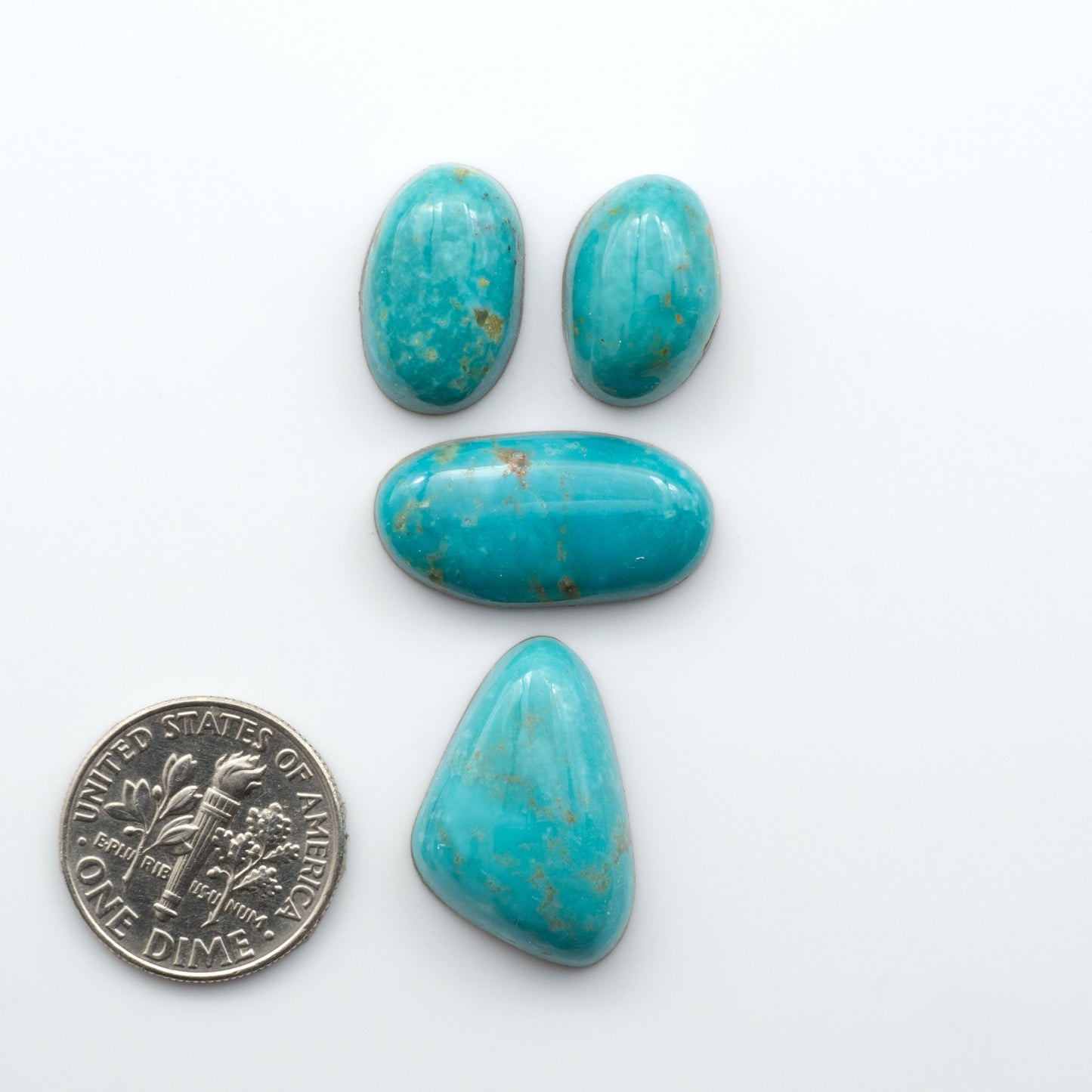 Experience the beauty of our stunning Turquoise Mountain Cabochons. With their distinctive blue and green color, these cabochons are perfect for adding a touch of natural elegance to any jewelry piece.&nbsp;