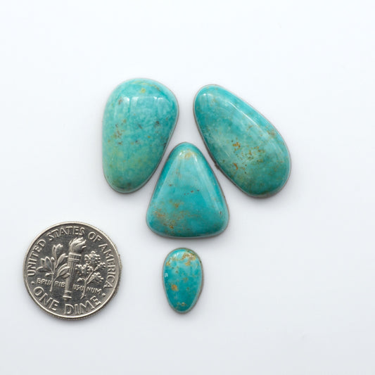 Experience the beauty of our stunning Turquoise Mountain Cabochons. With their distinctive blue and green color, these cabochons are perfect for adding a touch of natural elegance to any jewelry piece.&nbsp;