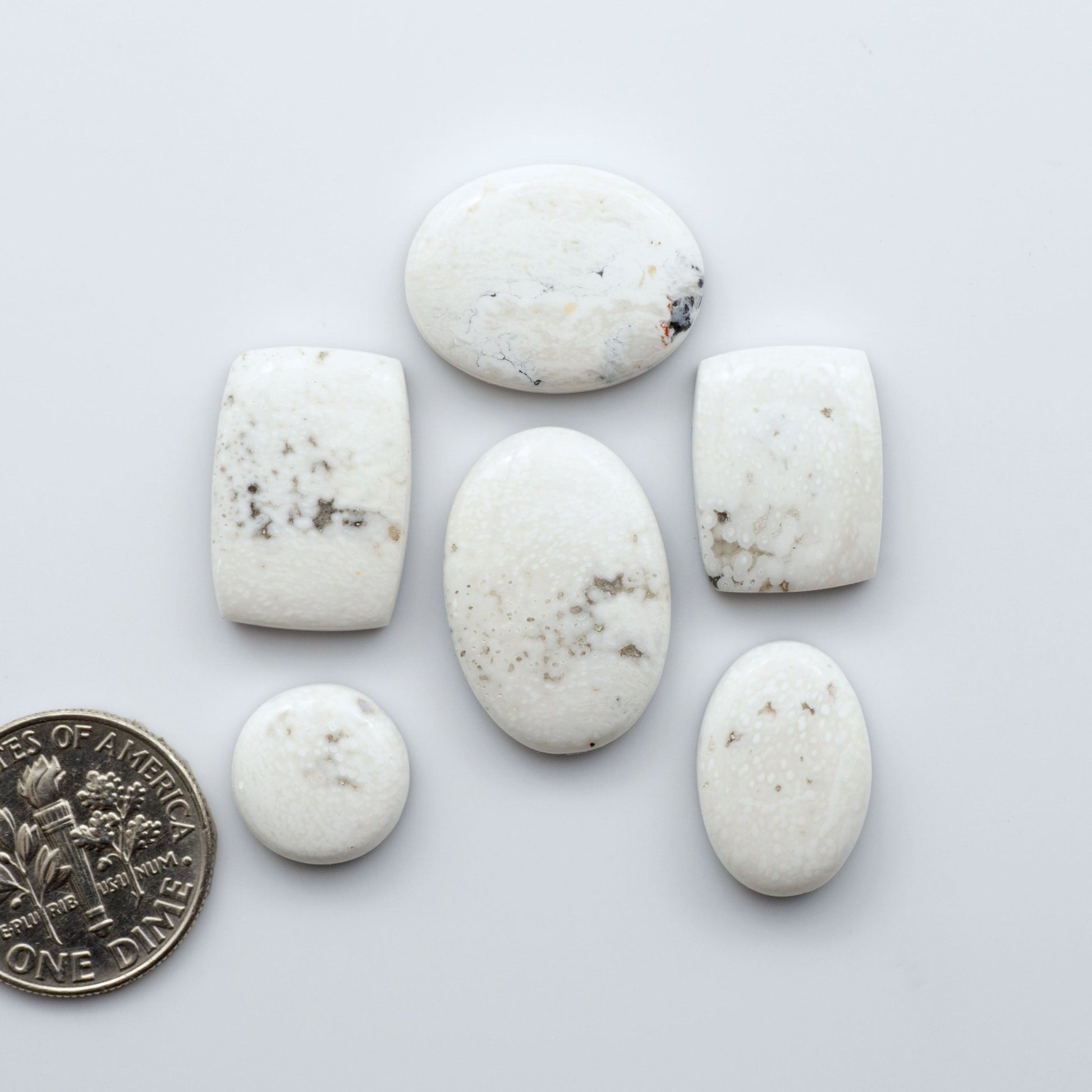 Our Natural White Buffalo Stone Cabochons are semi-precious gemstones cut into shapes ideal for jewelry-making, crafting and are backed for added strength.